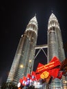 Seasons Greetings and a Happy New Year Sign at the Petronas Towers