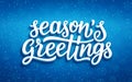 Seasons greetings lettering on blue background Royalty Free Stock Photo
