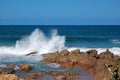 Seaspray shooting up into the air at Ramsgate, Kwazulu Natal. Royalty Free Stock Photo