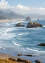 Sea stacks dot the surf at Cannon Beach on the Oregon Coast Royalty Free Stock Photo