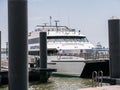 Seastreak Ferry pulls into slip on Pier 11, East River, New York