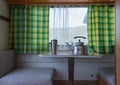 Seat and table inside the trailer. camper van interior