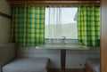 Seat and table inside the trailer. camper van interior. caravan trailer of large size