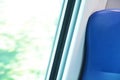 Seat and window in a modern train Royalty Free Stock Photo