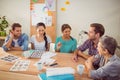 Seated creative business team working together Royalty Free Stock Photo