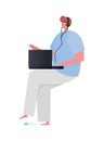 Seated man with laptop and headphone working vector design Royalty Free Stock Photo