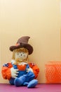 Seated Scarecrow Holding Its Britches Royalty Free Stock Photo