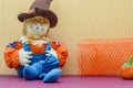Seated Scarecrow Holding Its Britches Royalty Free Stock Photo