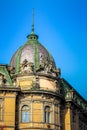 Seated statue of liberty on roof of museum of ethnography in Lviv city, Ucraine Royalty Free Stock Photo