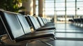 seater bench situating in airport, Empty metallic chairs in airport. Waiting room furniture photo. Airport departure or Royalty Free Stock Photo