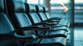 seater bench situating in airport, Empty metallic chairs in airport. Waiting room furniture photo. Airport departure or Royalty Free Stock Photo