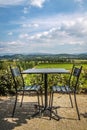 Seating area in the cafe with a view of the Provence countryside