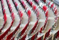 seating area detail of sport Stadium. curving rows of colorful plastic seats on steel frame. Royalty Free Stock Photo