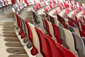 seating area detail of sport Stadium. curving rows of colorful plastic seats on steel frame.