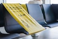 Seating area in Rissian Airport Terminal. Sign Keep Your Distance on Russian and English