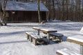 Seating group is snowed in in the winter forest Royalty Free Stock Photo