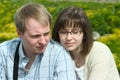 Seating young couple Royalty Free Stock Photo