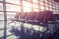 Seats in the airport waiting room at sunset Royalty Free Stock Photo