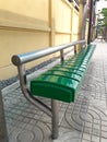 Seats at bus stop. The Green are made of metal