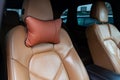 The seats in the car are made of leather with pillows for the neck and rest during long trips and travels Royalty Free Stock Photo