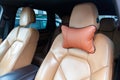 The seats in the car are made of leather with pillows for the neck and rest during long trips and travels Royalty Free Stock Photo