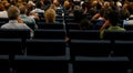 Seats rows in a theater hall room before the start of a choral spectacle