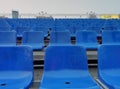 Seats at the stadium. shallow depth of field. Empty blue seats