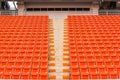 Seats on stadium steps bleacher with spot light pole Royalty Free Stock Photo