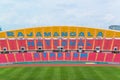 Seats on stadium steps bleacher with spot light pole