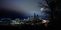 Seattle downtown at night with lunar eclipse