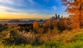 Seattle skyline at sunset in the fall with yellow foliage in the foreground view from Dr. Jose Rizal Park