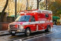 Seattle Fire Department Medic One ambulance in downtown on a wet day