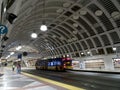 People wait for Sound Transit light rail train inside Pioneer Square station