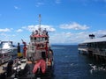 Fireboat parked at Dock with seagulls in the water Royalty Free Stock Photo