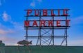 Famous Pike Place Market neon sign with a blue sky in the background Royalty Free Stock Photo