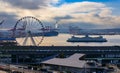 Seattle waterfront with Great Wheel and the Puget Sound with a ferry boat pulling into Royalty Free Stock Photo