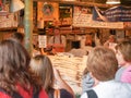 Pyke Place famous Farmers Market fish market counter with buyers and vendors around display