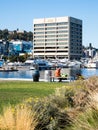 Visitors enjoying a sunny day on the waterfront in Lake Union Park - Seattle, USA Royalty Free Stock Photo