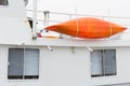 SEATTLE, WA - OCTOBER 28, 2017: Fishermen`s terminal. Orange lifeboat.