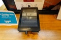 An Amazon Kindle Paperwhite device on sale at an Amazon Book Store