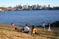 Seattle, WA, USA - August 3, 2023: People rest in Gas Works Park in city of Seattle