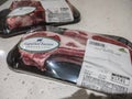 Seattle, WA USA - circa April 2022: Angled, selective focus on two packages of fresh American lamb on a kitchen counter