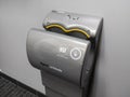 Seattle, WA USA - circa April 2022: Angled view of a Dyson Airblade hand dryer inside a public restroom Royalty Free Stock Photo