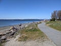 Seattle, WA USA - circa April 2021: Gorgeous view of the Olympic Mountain range on a cloudless day at Discovery Park Royalty Free Stock Photo