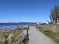 Seattle, WA USA - circa April 2021: Gorgeous view of the Olympic Mountain range on a cloudless day at Discovery Park Royalty Free Stock Photo