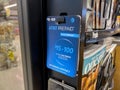 Seattle, WA USA - circa July 2023: Close up view of no contract prepaid phone cards for sale inside a QFC grocery store