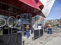 Seattle, WA USA - circa March 2022: Family with a baby stroller entering the Museum of Pop Culture on a bright, sunny day Royalty Free Stock Photo