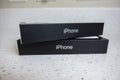 Seattle, WA USA - circa May 2022: View of two iPhone 13 Pro boxes on a kitchen counter inside a home Royalty Free Stock Photo