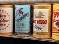 Close up, selective focus on old vintage beer cans inside a display case at the Taproom