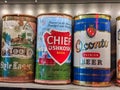 Close up, selective focus on old vintage beer cans inside a display case at the Taproom